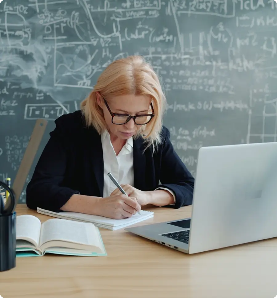 faculty member preparing her lessons